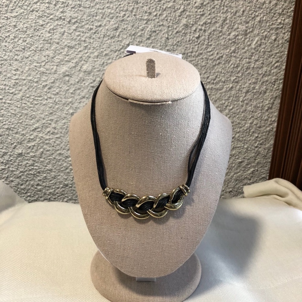 golden necklace with 4-loop leather cord